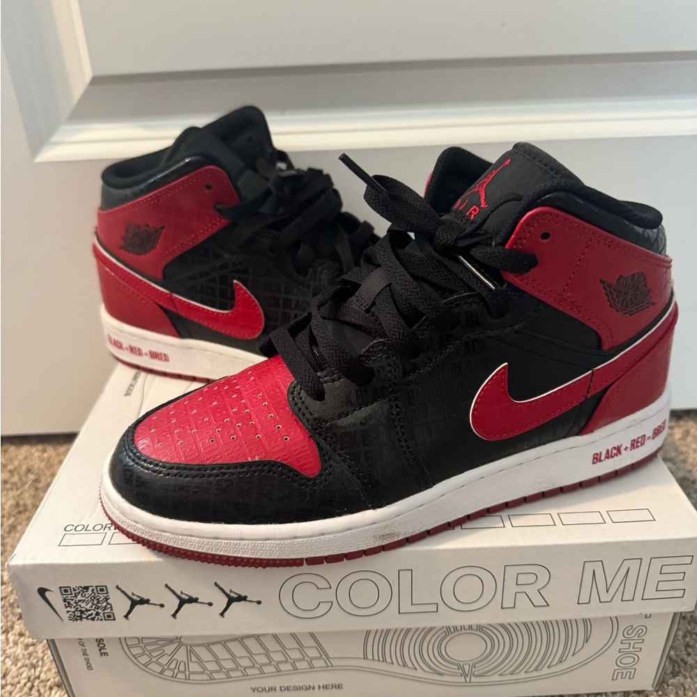 Air Jordan Black and Red Sneakers